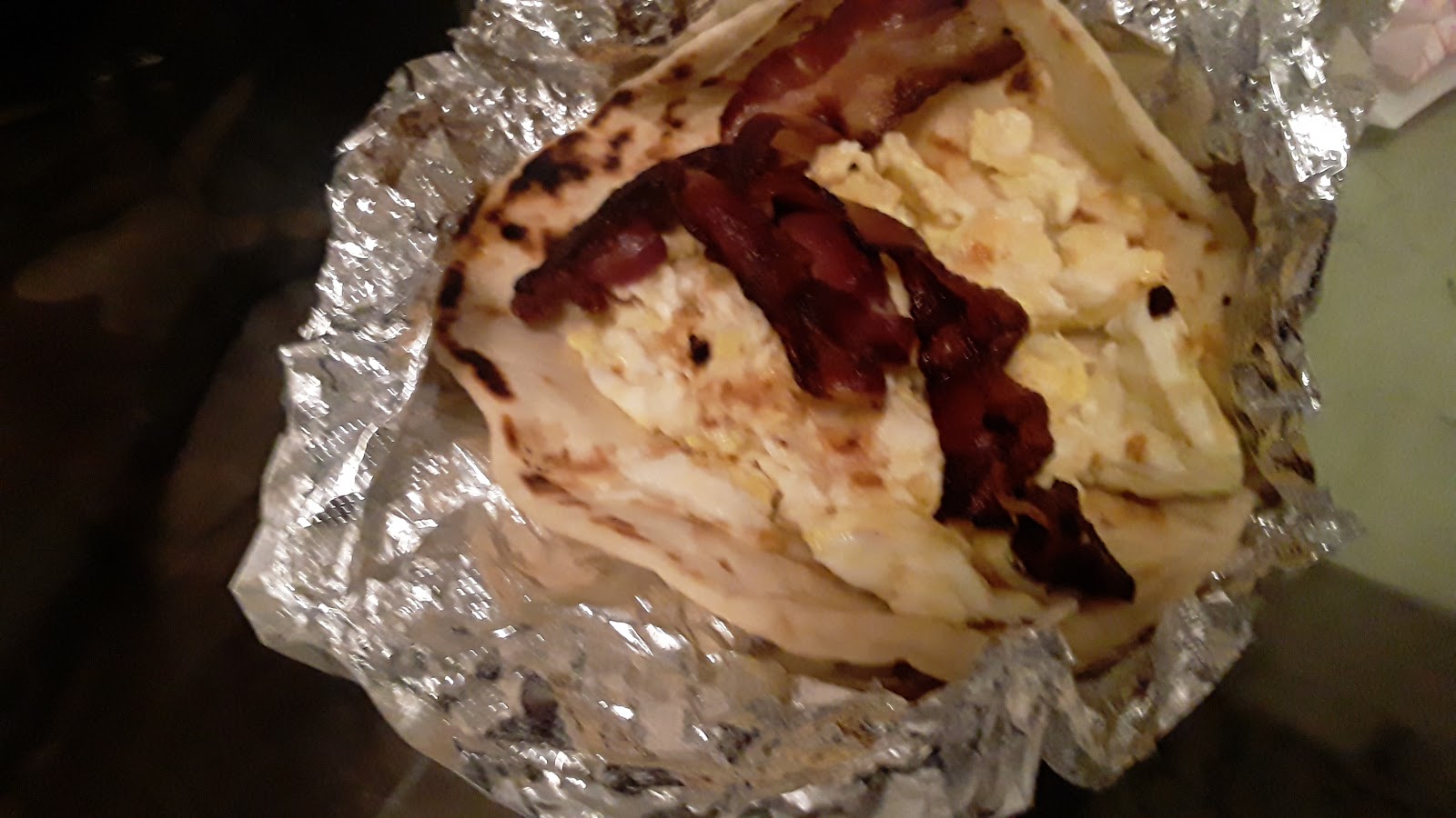 Bacon and egg taco on a homemade tortilla