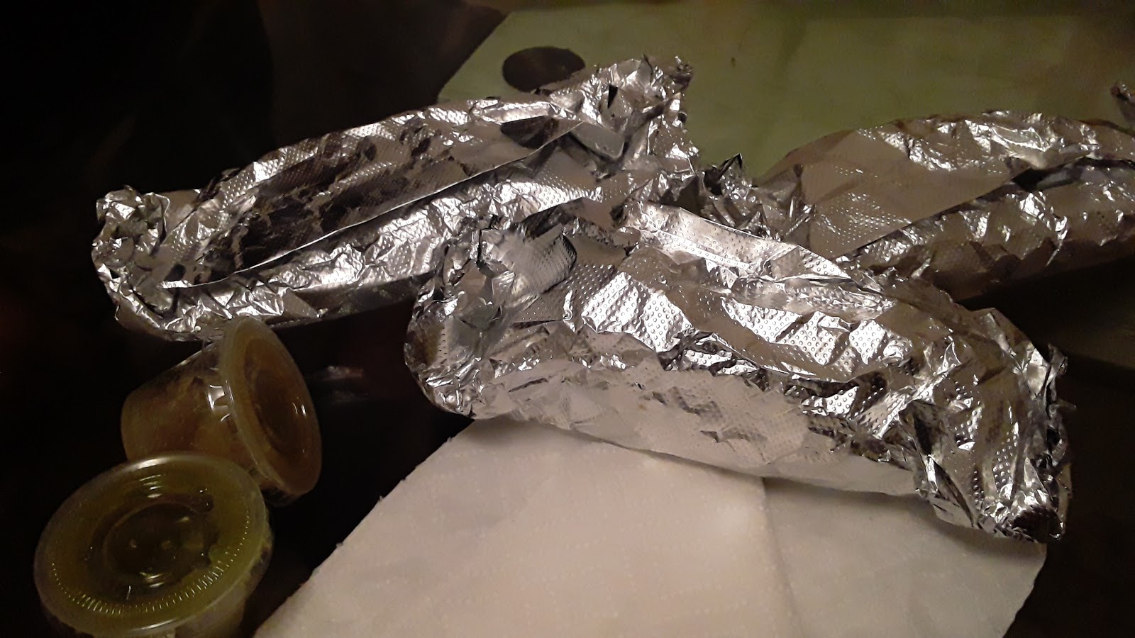 Foil-wrapped tacos to go with salsa
